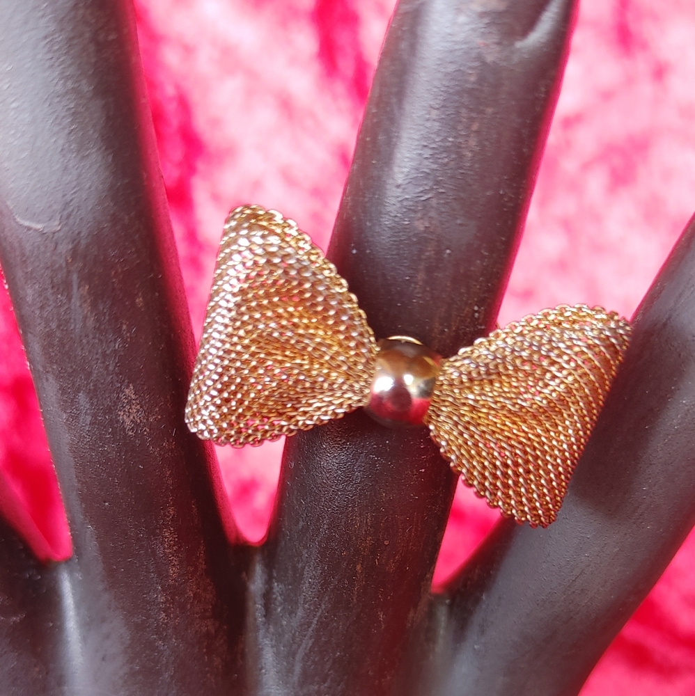Cute and fun gold bow tie ring.